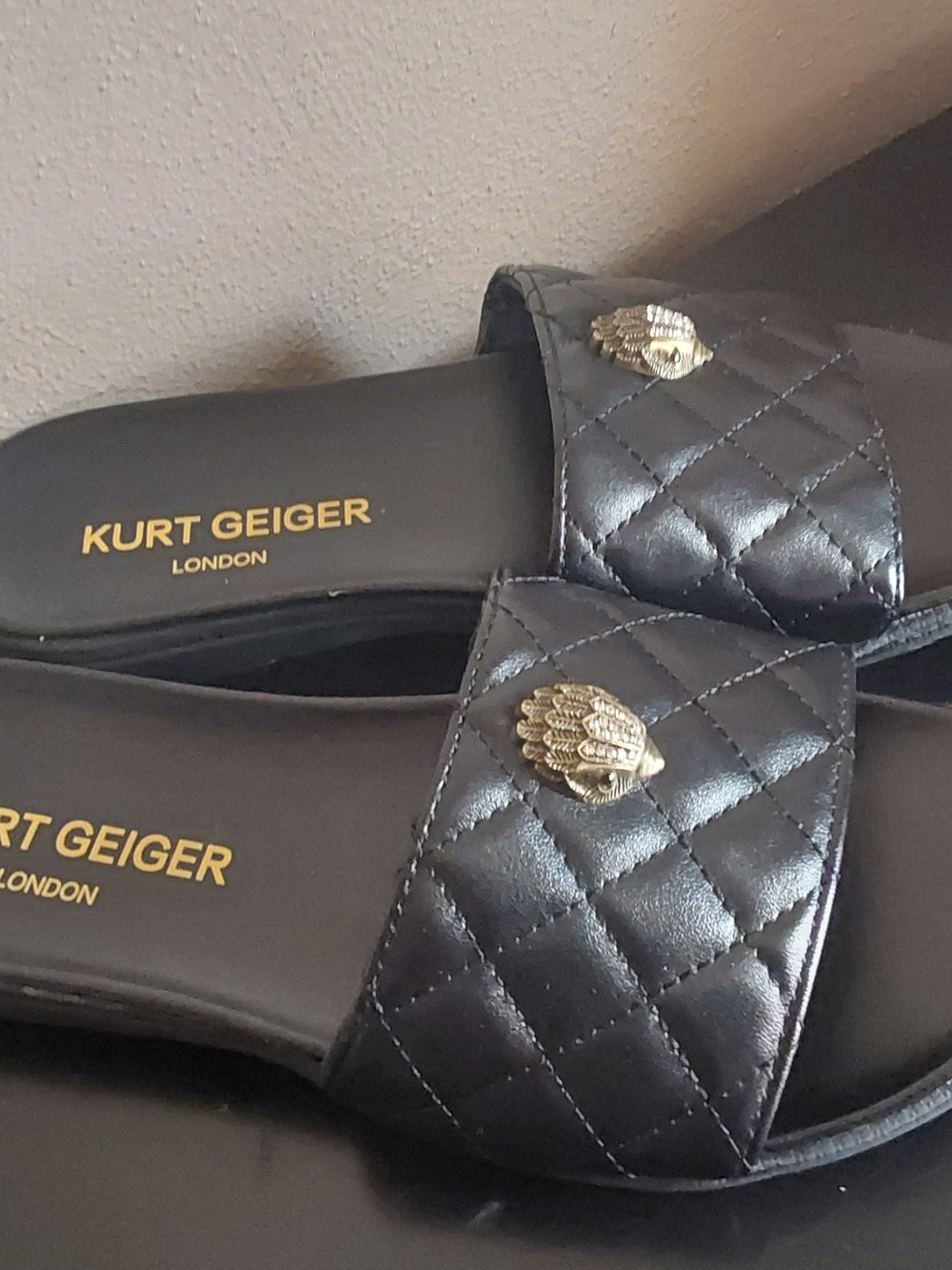 Kurt Geiger Black Quilted Slide Sandals with Gold Emblem